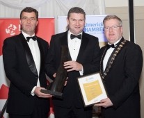 Pat O\'Sullivan, Master Chefs Hospitality, (centre) being presented with the \'Best Large Indigenous Business Award\' by Harry Fehily (Holmes O\'Maley Sexton) left, and Dr Fergal Barry, President , Limerick Chamber, at the Regional Business Awards at the Strand Hotel, Limerick. - Picture: Kieran Clancy Â© 15/11/2013