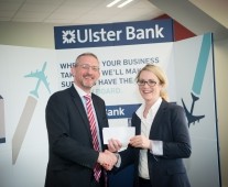 Colm O’Shea, Ulster Bank presenting the match tickets to Maeve Kiely, Laya Healthcare