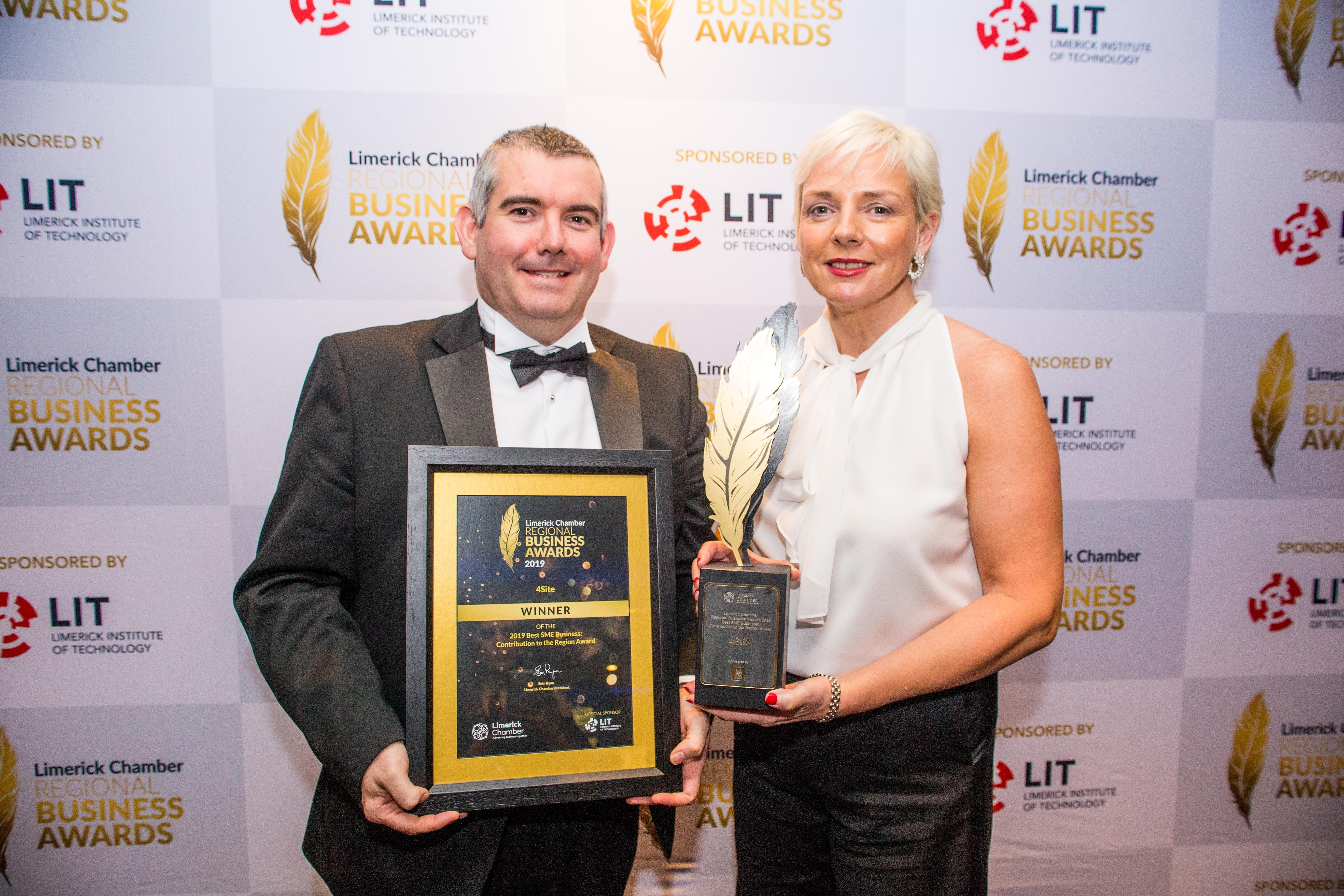 Mark O'Connor and Hillary Gormley of Foresight pictured with their award for Best Sme Business: Contribution to the Region at the Limerick Chamber President's Dinner. Photo: Cian Reinhardt