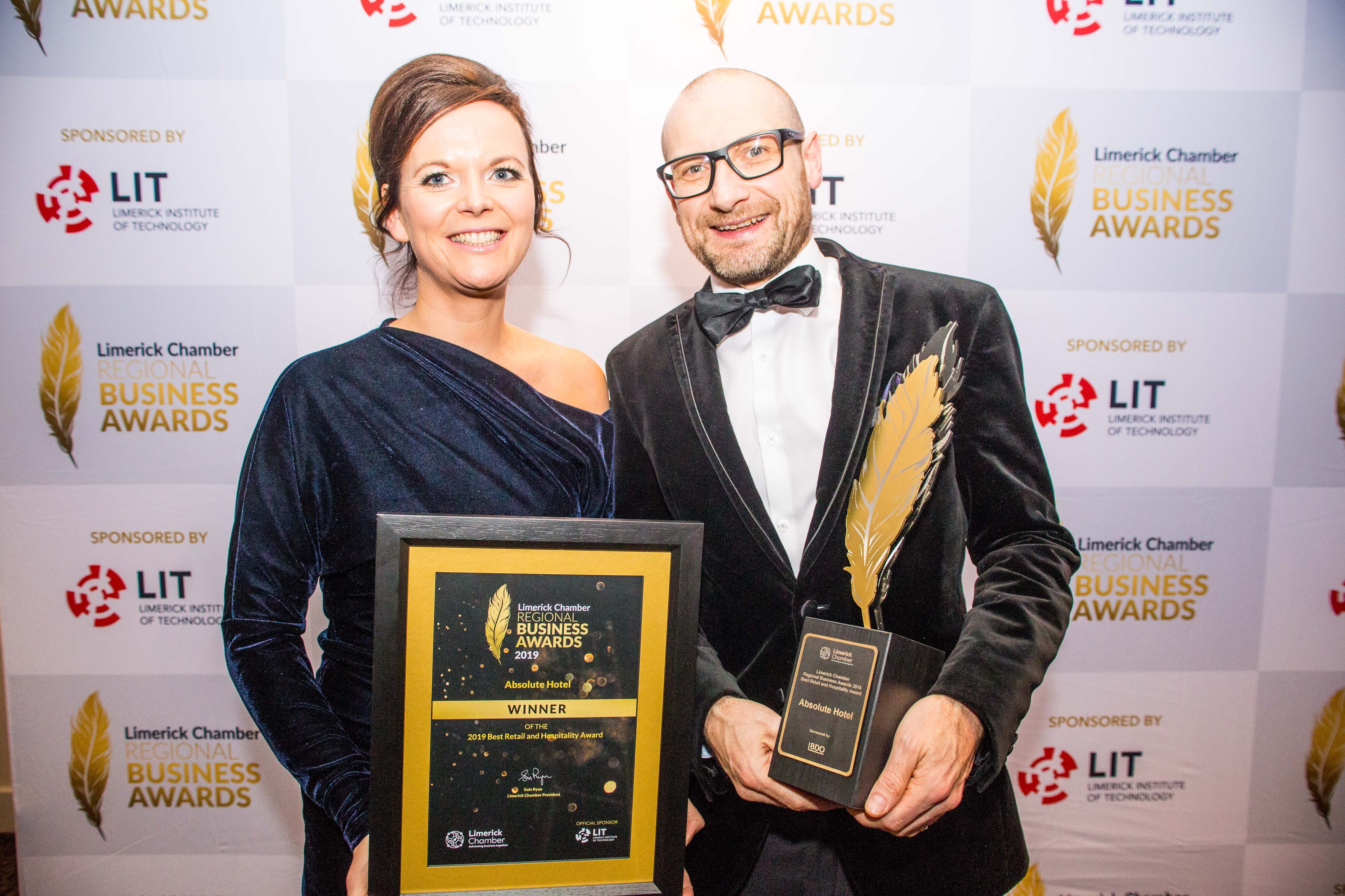 Melanie Lemon and Donacha Hurley of the Absolute Hotel pictured with their award for Best Retail and Hospitality at the Limerick Chamber President's Dinner. Photo: Cian Reinhardt